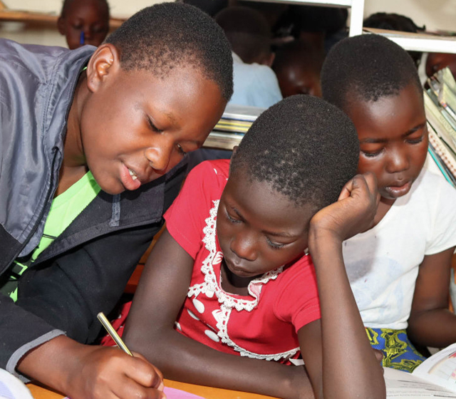 Girls in Kantaya program writing