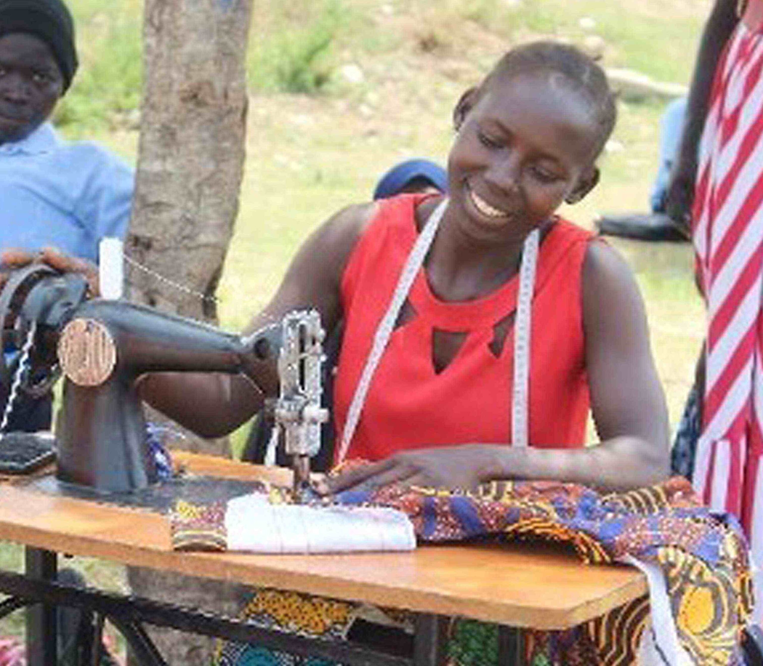Women in AHIO program sewing